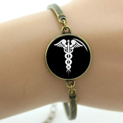 Caduceus Medical Symbol Alloys Made Dome Bracelet With 2mm Thick Glass